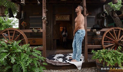 Manuel Ferrara fucks cowgirl Chloe Surreal on a shabby ranch.