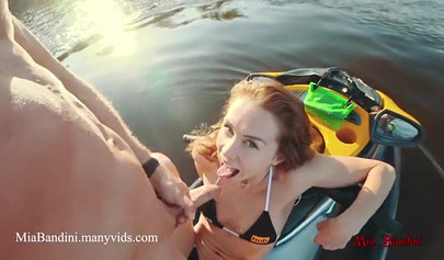 Petite teen rides hard in public on a jet ski