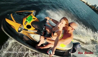 Petite teen rides hard in public on a jet ski