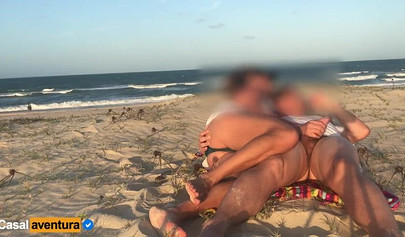 Blonde Brazilian MILF enjoys public anal on the beach as people watch nearby
